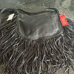 Black Fringe Carlos Santana Crossbody bag.